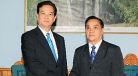 PM Dung holds meeting with Lao leader - ảnh 1